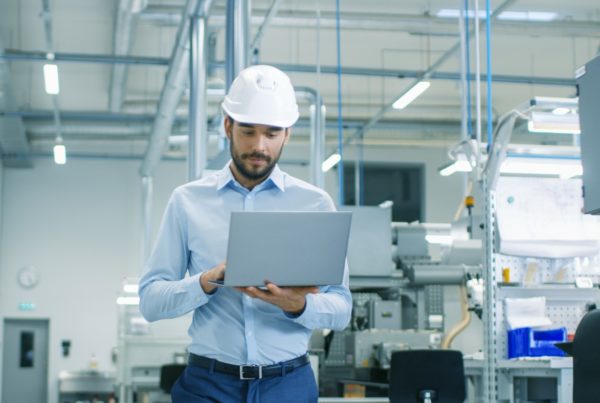 Man with Hardhat on work site Shutterstock
