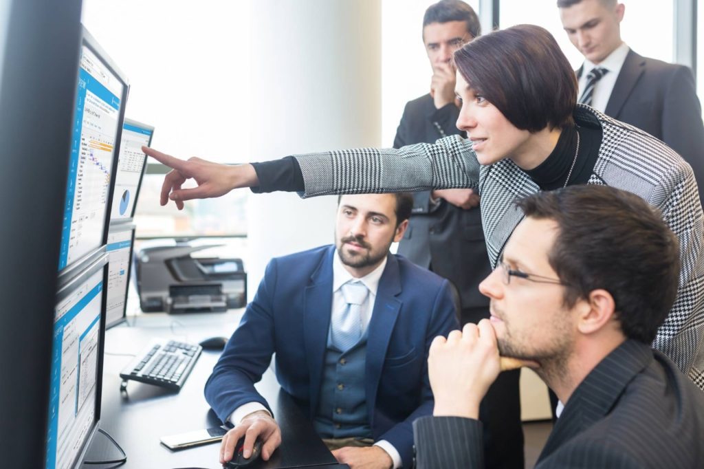 business team looking at axxerion software